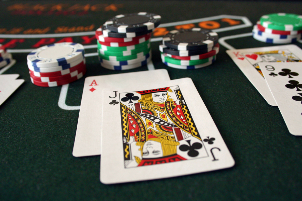 A close up image of a winning Blackjack hand at a casino table.