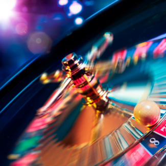 high contrast image of casino roulette in motion